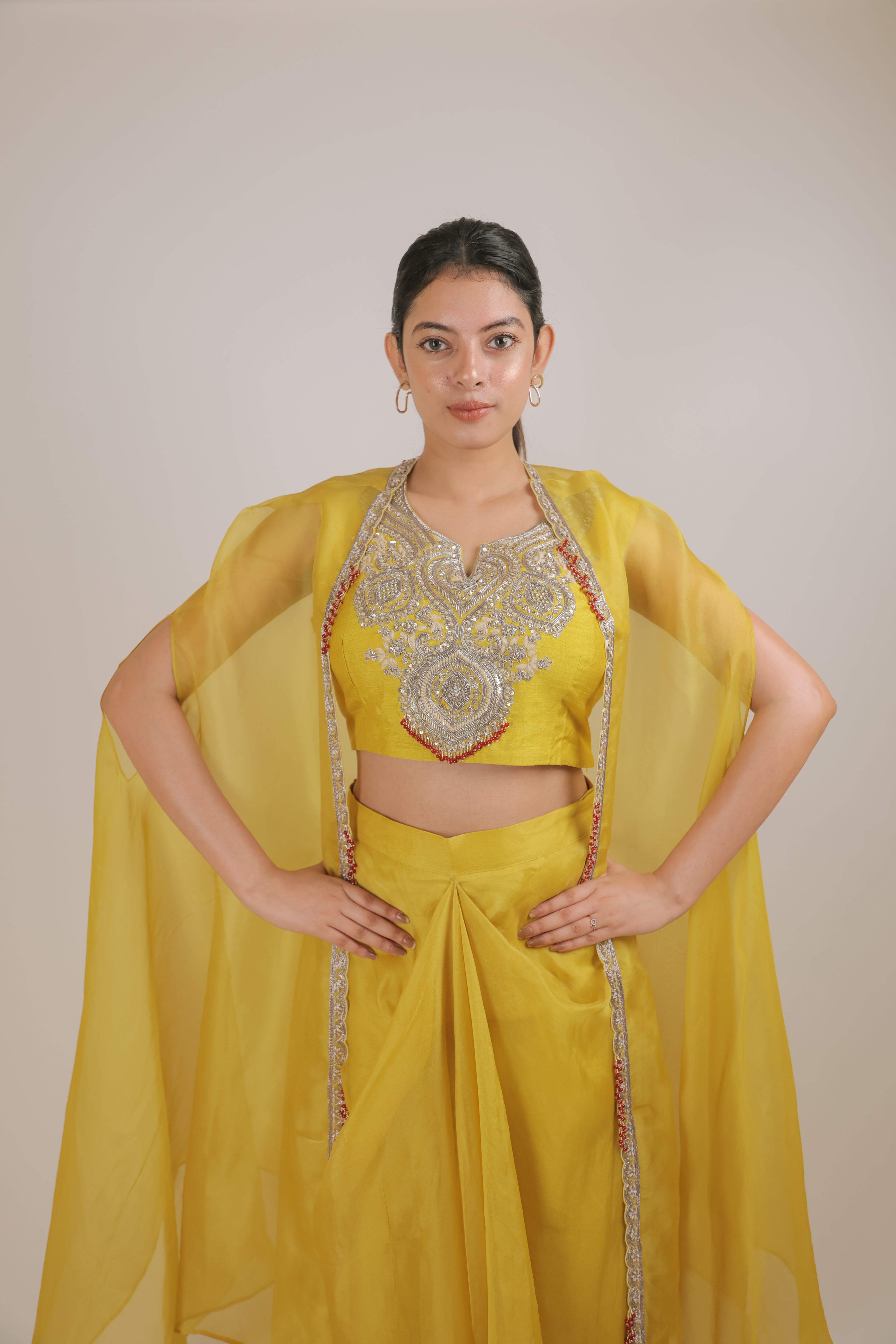 Mustard kora cape with pleated skirt