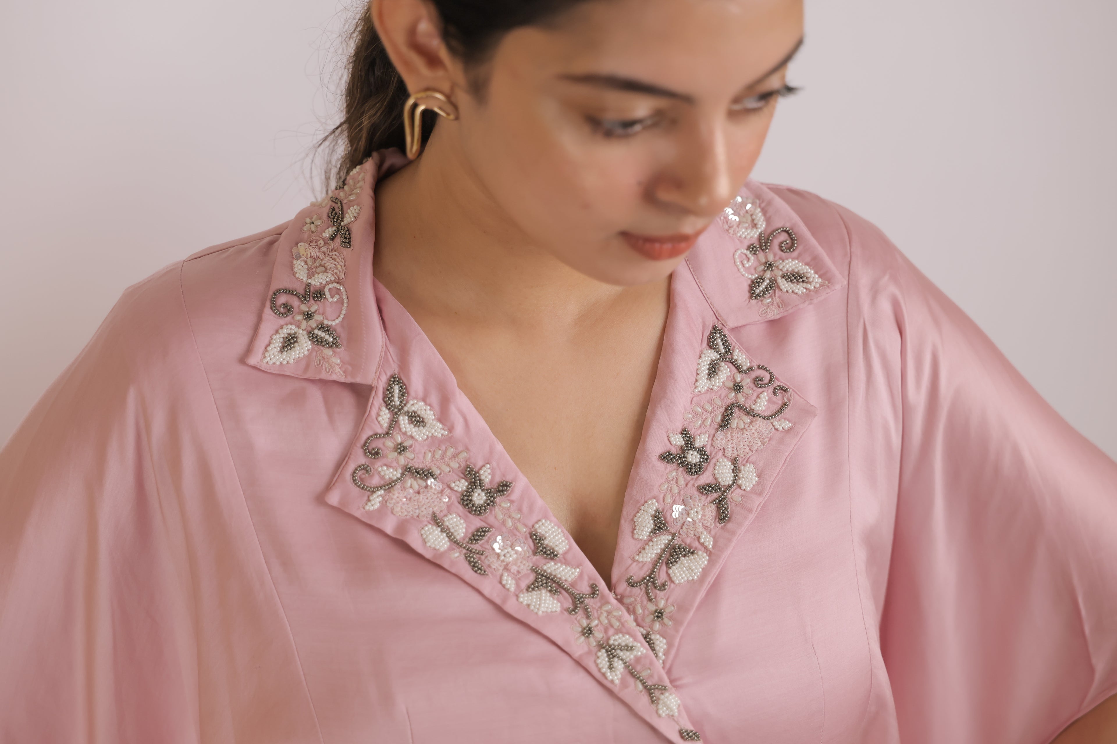 Pink collar with pleated skirt